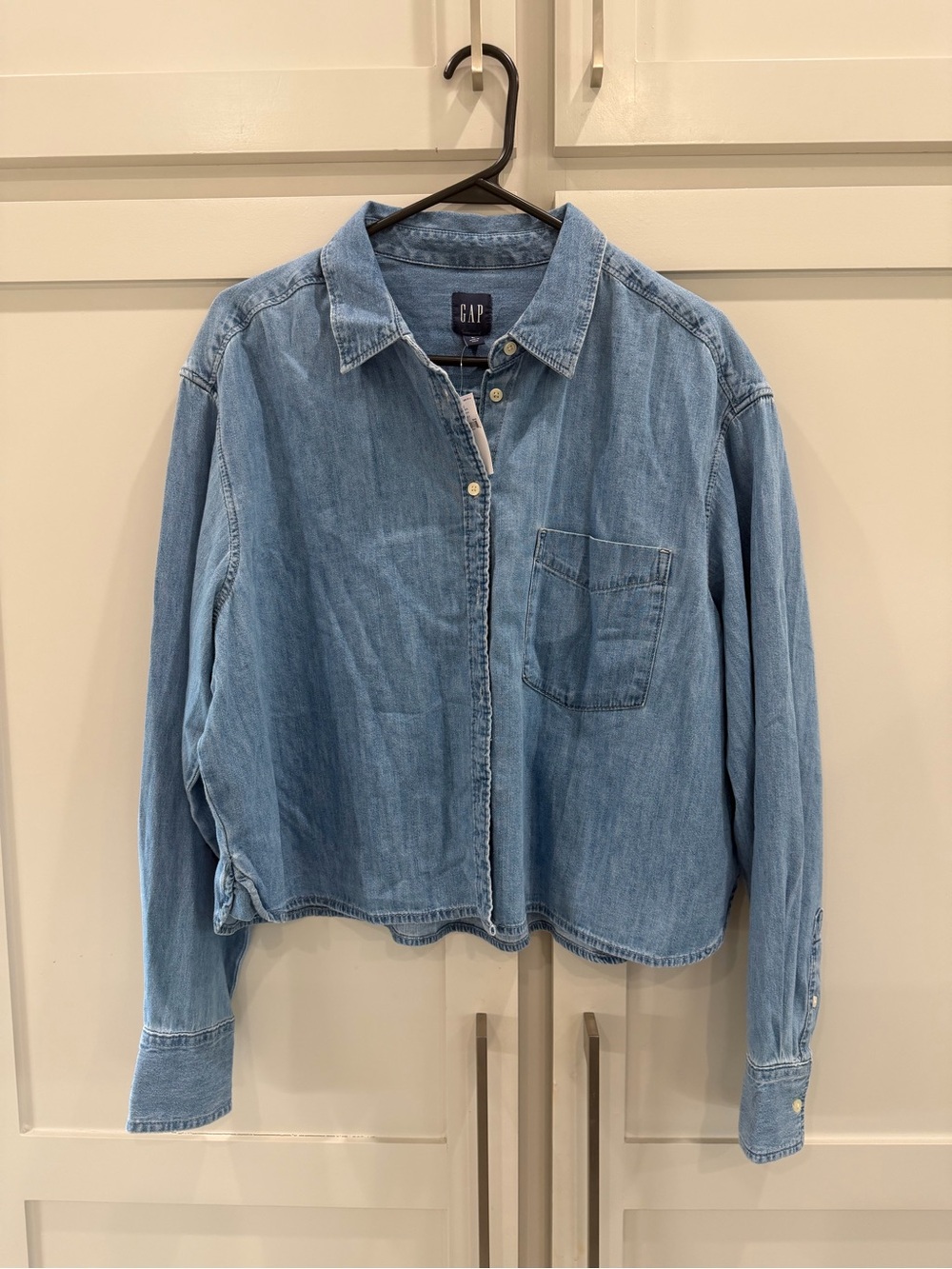Gap long sleeve button down cropped denim shirt.